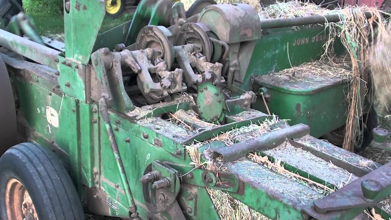 how does a manual tie round baler work